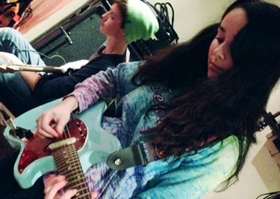 Becky Hall on guitar